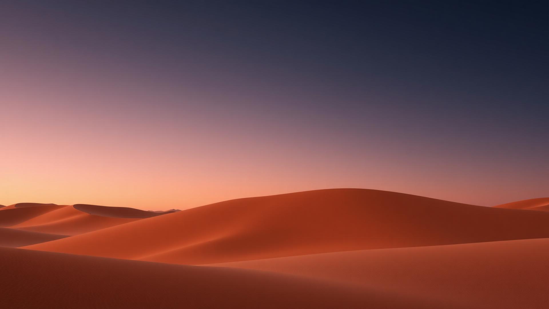 Warm horizon over desert dunes at dawn